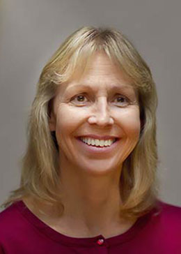 Portrait of Heidi Laug, Woman with Shoulder Length Blonde Hair and a Red Shirt