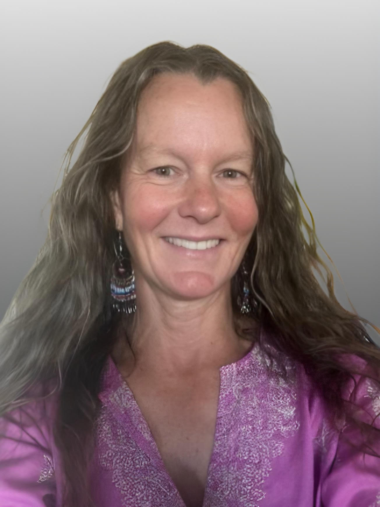 Portrait of Julie Henningsen With Long Blonde Hair and Black Shirt